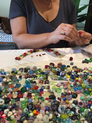 threading beads, jewellery making workshop
